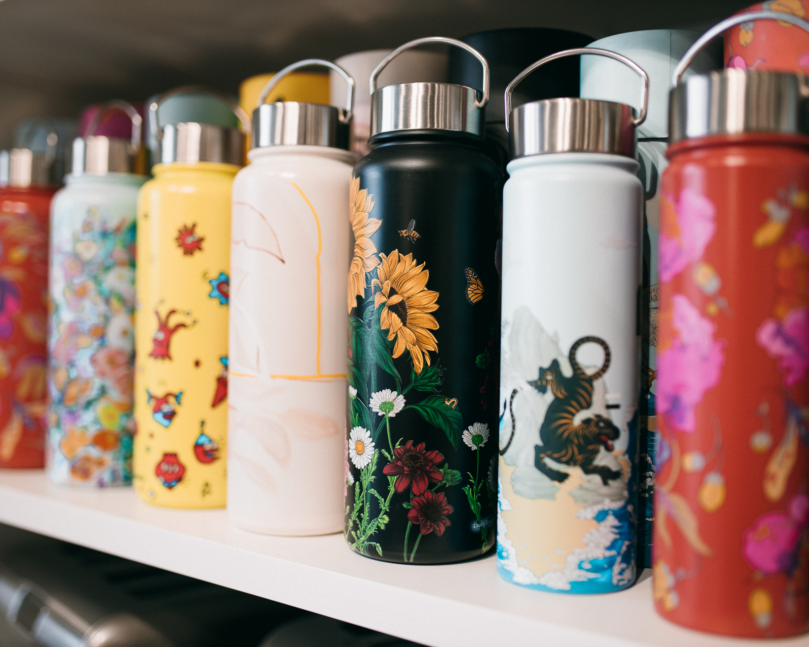 A selection of reusable water bottles - a great item for when you're out & about in Wānaka.